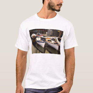 Fog surrounds four boats docked. T-Shirt