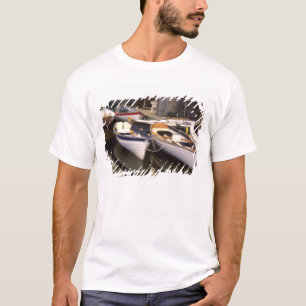 Fog surrounds four boats docked. T-Shirt
