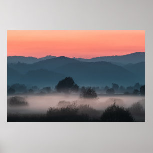 Foggy landscape at sunset poster