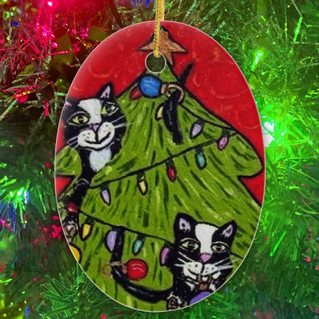 Folk Art Cats Christmas Tree Ceramic Tree Decoration (Naughty cats climbing in Christmas tree with gold star and lights on oval Christmas ornament.)