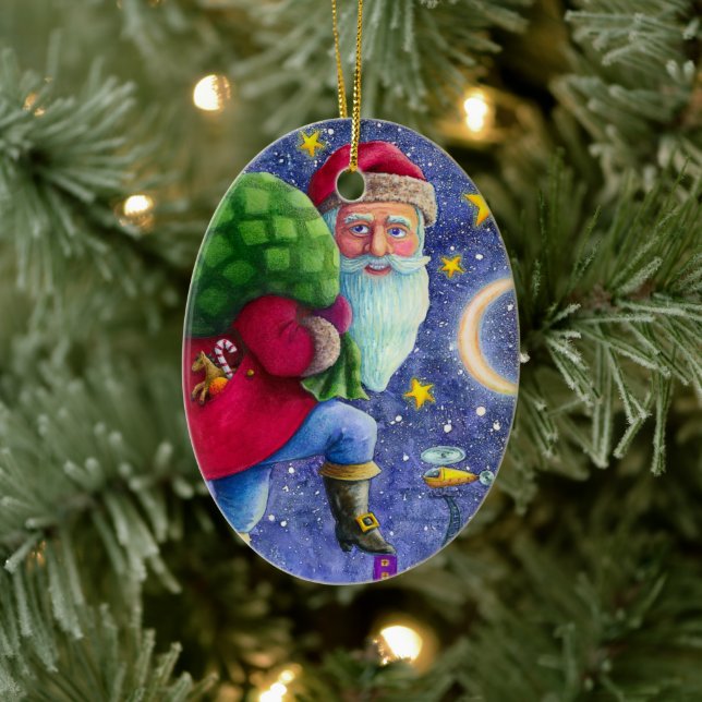 FOLK ST. NICK TIPTOES ON ROOFTOPS WITH BAG OF TOYS CERAMIC ORNAMENT (Tree)