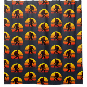 Folklore creature Bigfoot with a setting sun. Shower Curtain