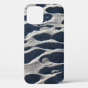 Foot prints on sand during daytime iPhone 12 case