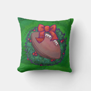 Football in Christmas Wreath on Green Cushion