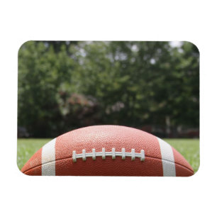 Football in Green Grass Closeup Magnet