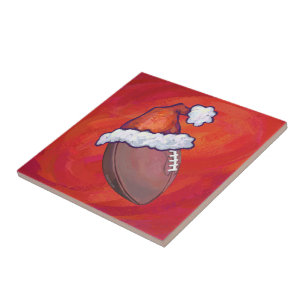 Football in Santa Hat on Red Ceramic Tile