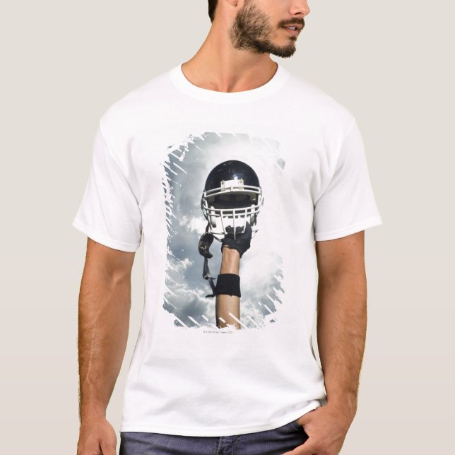 Football player holding helmet in air T-Shirt (Front)