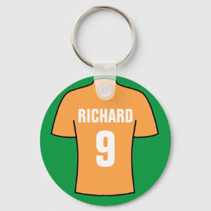 Football shirt design in old gold. keychain