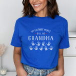 For Grandma with Grandkids Names Personalised T-Shirt<br><div class="desc">Show your love for your favourite people/grandkids with this one-of-a-kind tshirt! Change the recipient's name from grandma to Mimi, Gigi, Nana or whatever your little ones call you - then add their names to the handprints below. There are currently 9 handprints and names but if you have fewer grandchildren, just...</div>