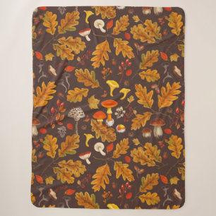 Forest mushrooms and autumn flora on brown sherpa blanket