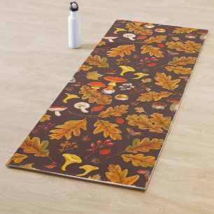 Forest mushrooms and autumn flora on brown yoga mat