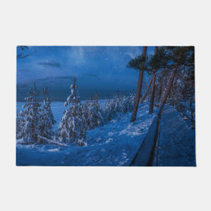 Forest path at winter night doormat