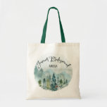 Forest Wonder Junior Bridesmaid  Wedding Tote Bag<br><div class="desc">Forest Wonder Junior Bridesmaid Wedding Tote Bag Bridal party tote features a watercolor woodland design with pine trees, mountains and billowing clouds, soft hunter greens and golden greens, soft blues and greys, with "junior bridesmaid " inscribed inside in hand lettered script. With one click, you can change the name to...</div>