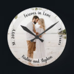 Forever in Love Wedding Anniversary Photo Round Clock<br><div class="desc">Keep your significant other close with this photo anniversary keepsake with photo,  sentiment,  name,  marriage and number of years married.  Composite design by Holiday Hearts Designs.</div>