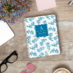 Forget Me Not Pattern Monogrammed Notebook<br><div class="desc">Pretty notebook with a floral pattern of forget-me-nots in blue and green against a white background. Personalise by adding your name,  initial and the subject of the notebook on the blue label. A cute notebook for your thoughts and ideas.</div>