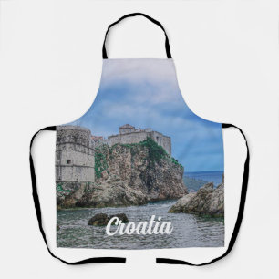 Fortress walls, rocky coast and sea in Croatia Apron