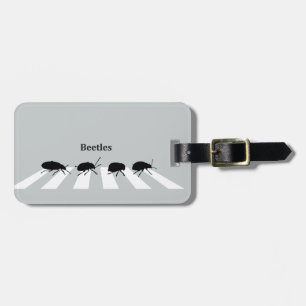 Four beetles walking across a crosswalk in London… Luggage Tag