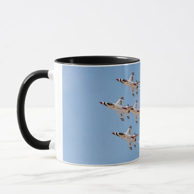 Four F-16 Thunderbirds fly in close formation Mug (Left)