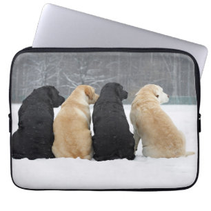 Four Labrador Dogs In Snow Laptop Sleeve