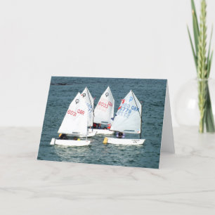 Four Optimist sailing boats Holiday Card