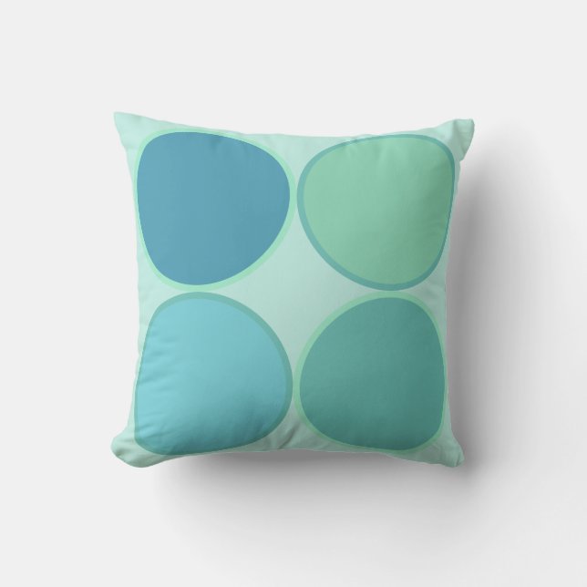Four sea green and cyan teal blue circles on mint cushion (Front)
