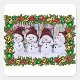 Four smiling toy snowmen square sticker