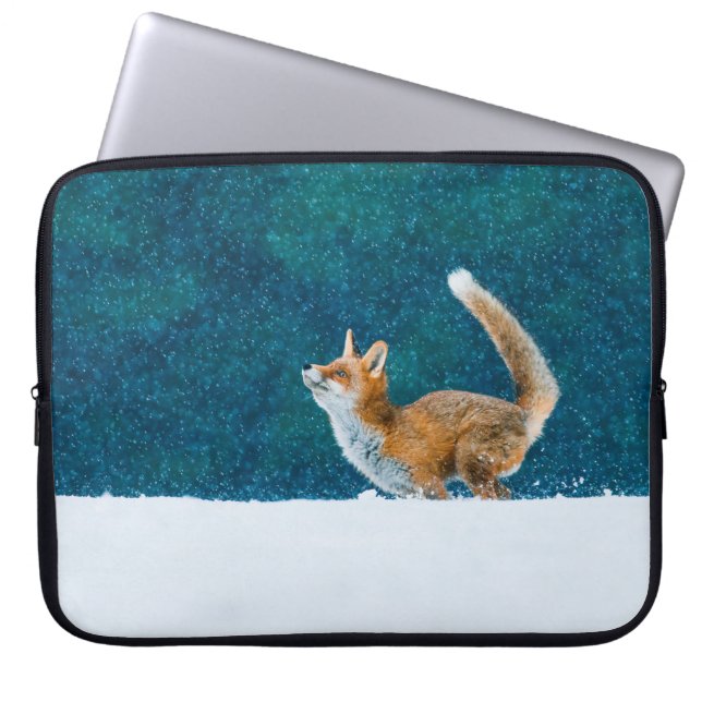 Fox in snowfall. Red fox, Vulpes vulpes, jumping i Laptop Sleeve (Front)