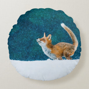 Fox in snowfall. Red fox, Vulpes vulpes, jumping i Round Cushion