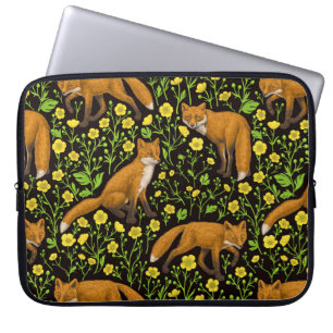 Foxes and buttercups on black laptop sleeve