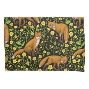 Foxes and buttercups on black pillowcase
