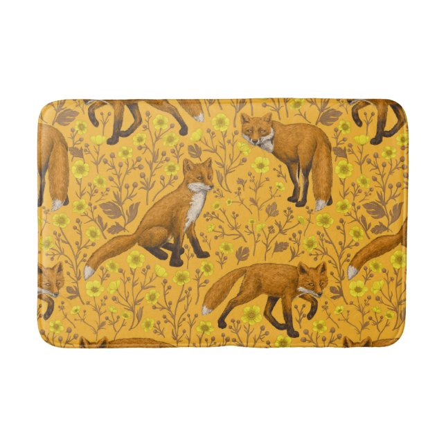 Foxes and buttercups on orange bath mat (Front)