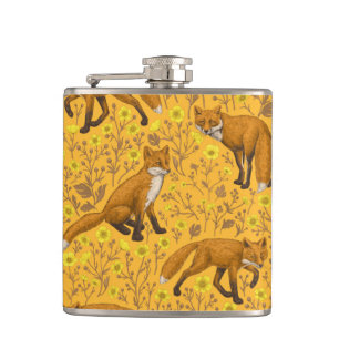 Foxes and buttercups on orange hip flask