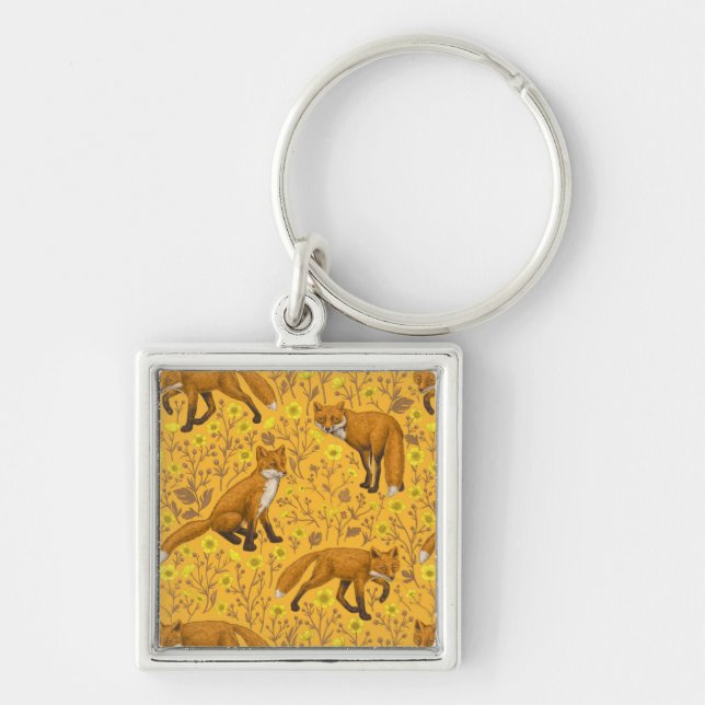 Foxes and buttercups on orange key ring (Front)