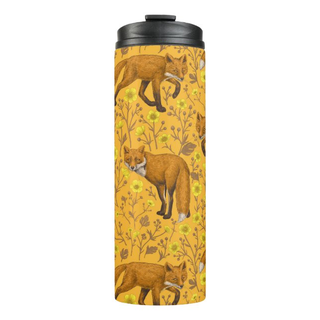 Foxes and buttercups on orange thermal tumbler (Front)