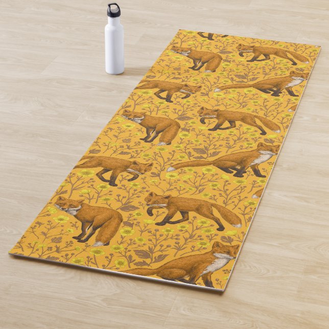 Foxes and buttercups on orange yoga mat (In Situ)