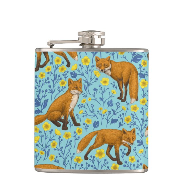 Foxes and buttercups on pool blue hip flask (Front)