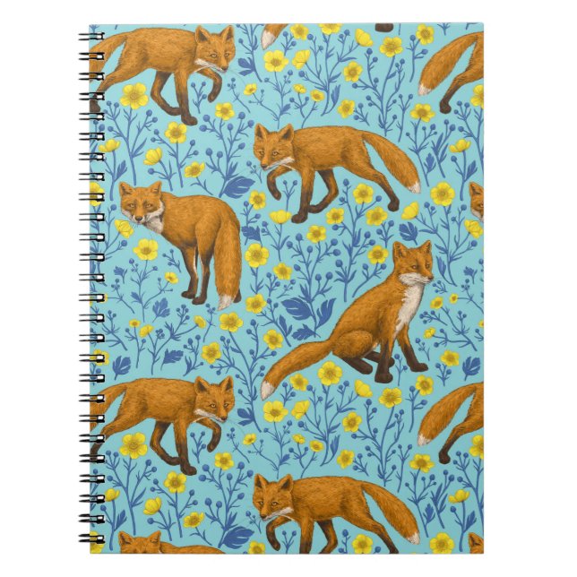 Foxes and buttercups on pool blue notebook (Front)