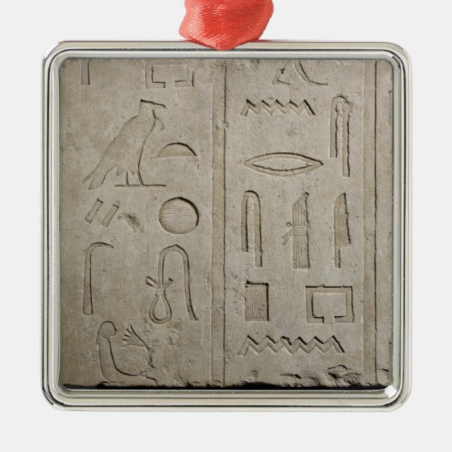 Fragment of a hieroglyphic inscription metal tree decoration (Front)