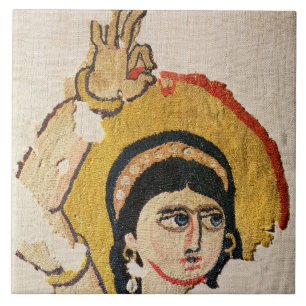 Fragment of a tapestry depicting the head of a dan ceramic tile
