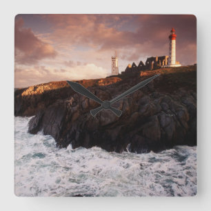 France, lighthouse at dawn square wall clock