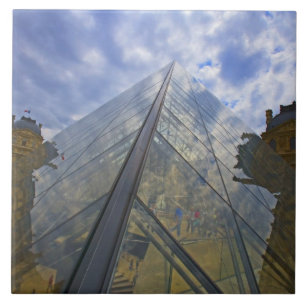 France, Paris. Clouds reflect off the Louvre Ceramic Tile