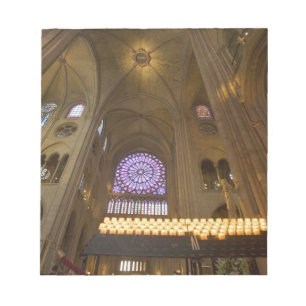 France, Paris. Interior of Notre Dame Cathedral. Notepad