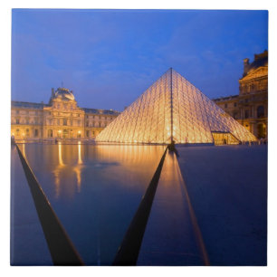 France, Paris. The Louvre museum at twilight. Ceramic Tile