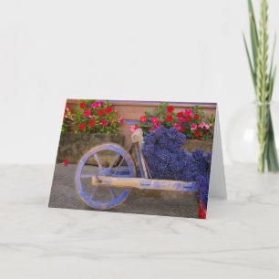 France, Provence, Sault. Old wooden cart with Card