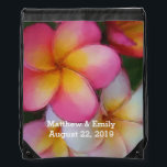 Frangipani Plumeria Flowers Wedding Favour Drawstring Bag<br><div class="desc">A watercolor sketch of frangipani plumeria flowers, painted in pretty shades of pink, yellow, lavender purple and white. Personalise these floral wedding totes with a couple's names and wedding date. These are great for beach, tropical, island, Hawaiian and destination weddings. Just place in some flip flops, sunblock, and visitors guides...</div>