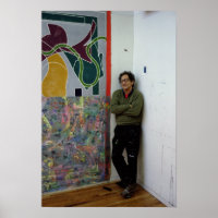 Frank Stella beside one of his works