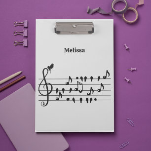 Free as a bird, song birds acting as musical notes clipboard