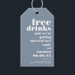 Free Drinks Getting Married Blue Save The Date Gift Tags<br><div class="desc">A funny typographical design to invite your guests to save your wedding date which is fully customisable. The text is all aligned to the right, with bold white typography Free Drinks followed by And We’re Getting Married Too on a dusty blue background. Fully customisable. Easily personalise the words and text...</div>
