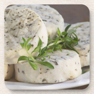 French goat cheese - chevre - with herbs on a coaster