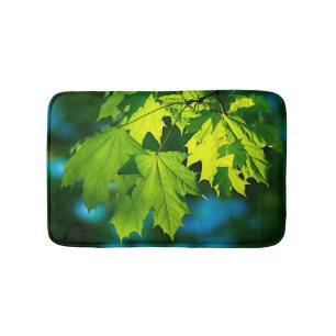 Fresh green maple leaves bath mat